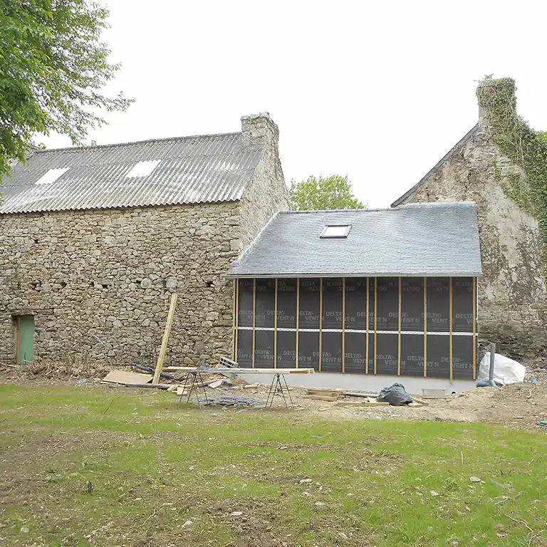 Extension ossature bois maison ancienne en pierre